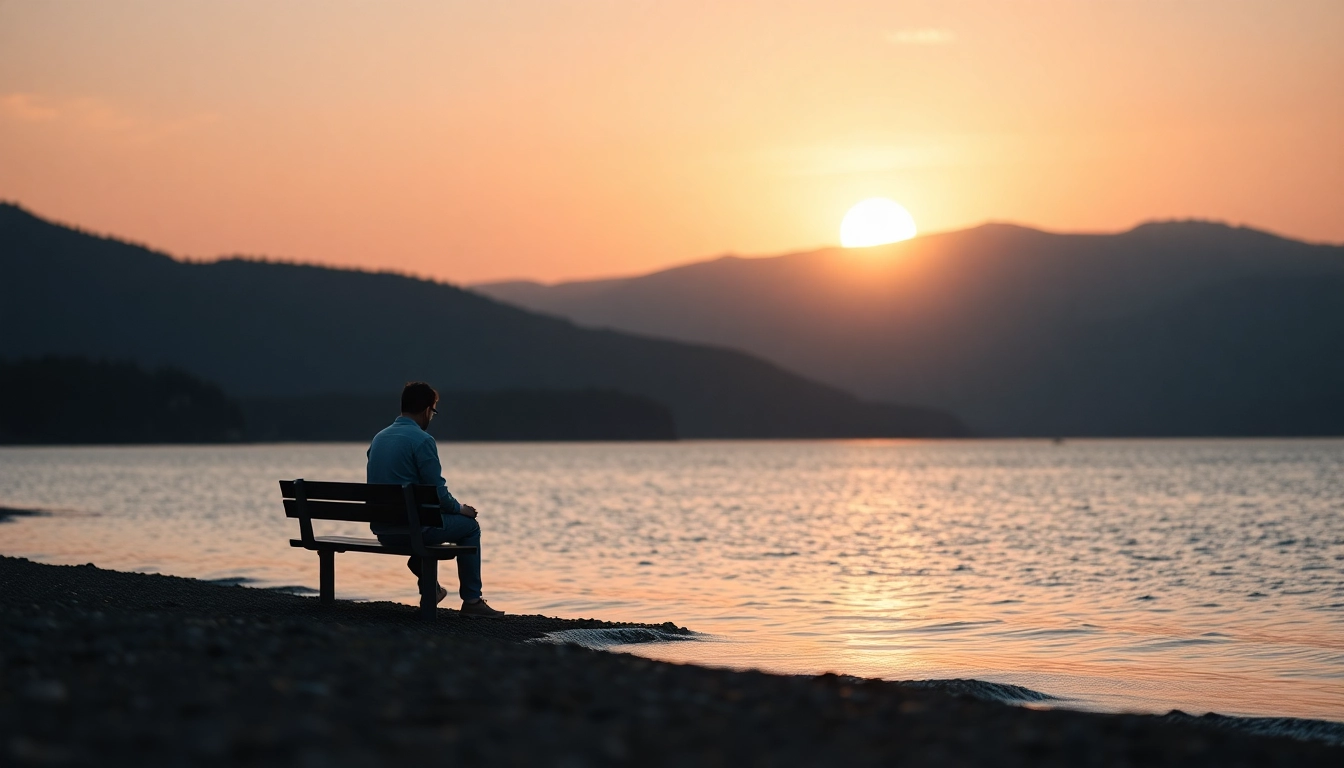 A person reflecting by a lake, symbolizing dealing with grief in a tranquil setting.